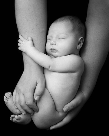 Baby girl in Mums hands
