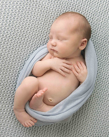 Newborn baby boy on beanbag