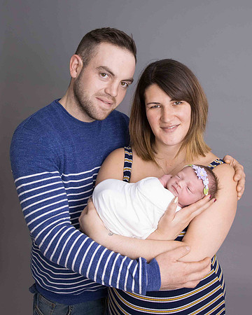 Parents with newborn baby girl