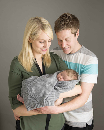 Parents with newborn baby girl